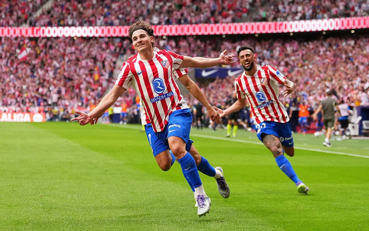 Jogadores do Atlético de Madrid em ação no relvado