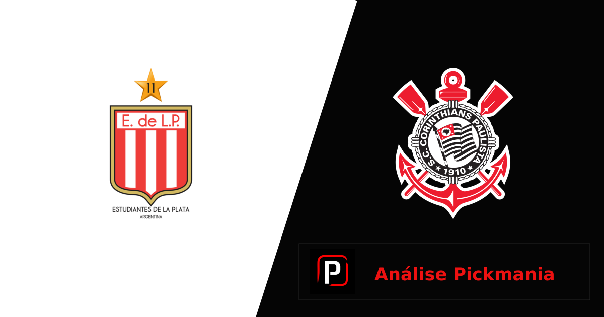 Jogo de futebol num estádio à noite sob os holofotes